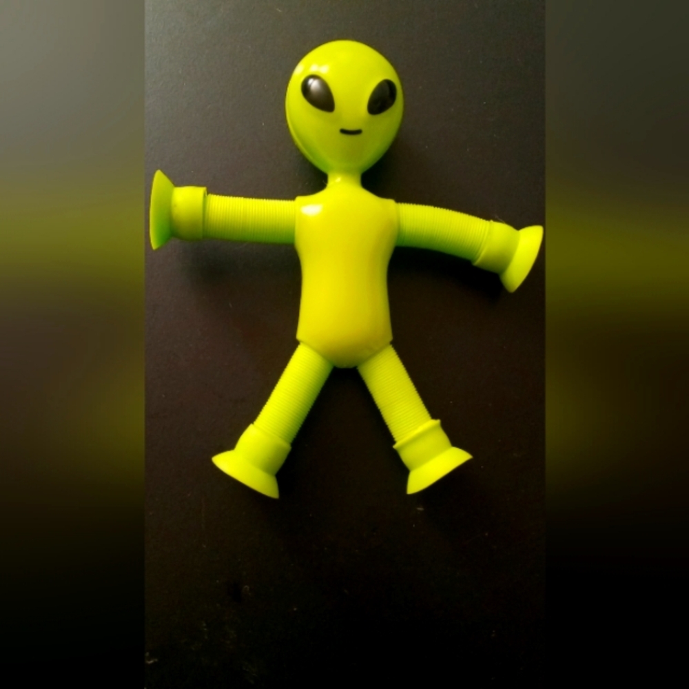 Stretchy Green Alien Figure Toy - Flexible Suction-Cup Character